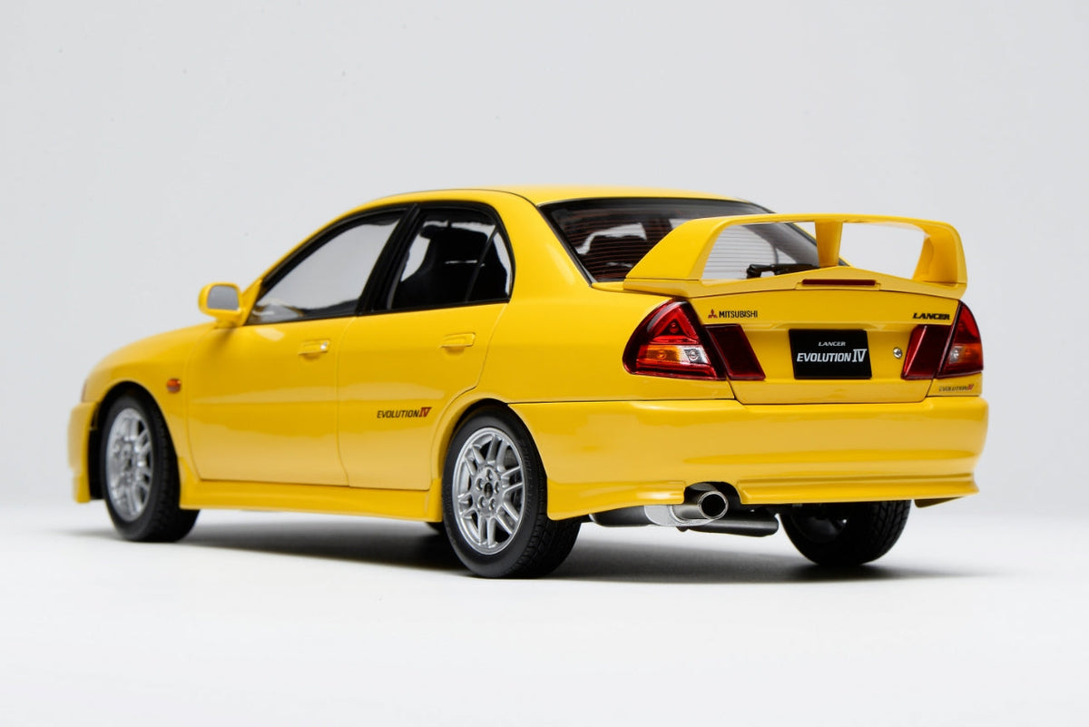 Motorhelix 1:18 Mitsubishi Lancer Evolution IV DANDELION YELLOW M84006