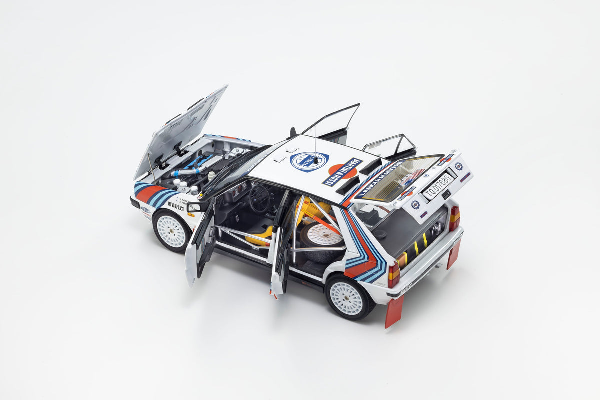 Kyosho 1:18 Lancia Delta HF 4WD 1987 Olympus Rally MARTINI ROSSI Nr. 3 08960E
